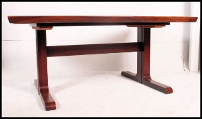 A stunning rosewood extending dining table by Spottrup of Denmark.
