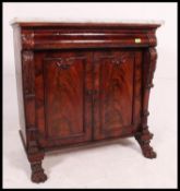 An 19th century William IV Irish mahogany and marble top chiffonier sideboard.