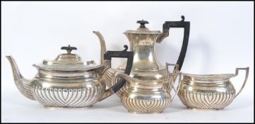 A silver hallmarked tea / coffee service to include teapot, coffee pot, sugar bowl and creamer.
