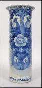 A 19th century Chinese tall blue and white cylindrical vase having scenes of nesting birds and