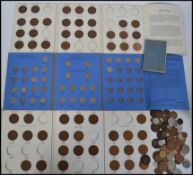 A collection of coins to include Coin Collectors Folders x 2, Great Britain Sixpence collection,