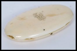A 19th century ivory cased sewing set, the ivory case of lozenge form being, monogrammed to the lid.