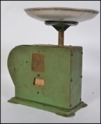 A set of vintage mid 20th century Industrial Kitway scales, in green,