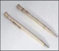 2 silver hallmarked 20th century propelling pencils,