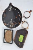 A pair of gold and tortoiseshell spectacles complete with case together with a tortoiseshell and