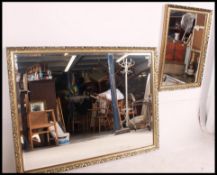 A large 20th century antique style mirror with gilt frame and bevelled edge mirror glass to centre.