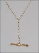 A 9ct gold pendant chain necklace with a bar pendant.