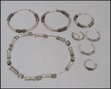 A collection of silver - white metal ( tests as silver) byzantine jewellery to include earrings of