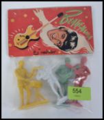A set of Beatles ' Beatlemania ' Emirober plastic figures. Still sealed, with original card topper.