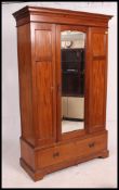 A good Edwardian solid mahogany wardrobe.