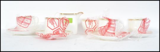 A Royal Doulton part tea service in the Concord pattern No H5049 comprising cups, saucers creamer,