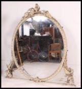 A stunning oversized Victorian painted wood and plaster gesso overmantel,