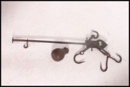 An antique cast & wrought iron forged farmers weight stick 100x20cm