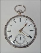 A silver hallmarked pocket watch with inset movement marked serial no 3095.