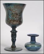 A Monart / Vasart style wine goblet / glass of mottled blue design along with a similar hand made