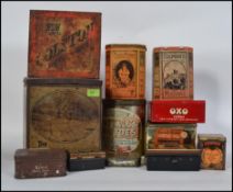 A collection of vintage tins to include shop counter display / dispensing biscuit tin,