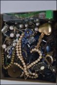 A collection of costume jewellery to include necklaces etc.