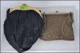 A vintage ladies white metal silver plate mesh clutch bag purse together with a 1920's lucite clip