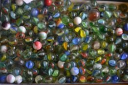 A collection of vintage glass marbles to include bulls eyes etc please see images