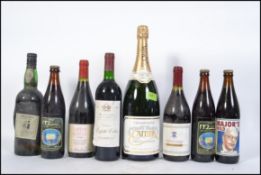 A collection of bottled Wine, Beer and Champagne to include a Magnum of Cartier champagne,