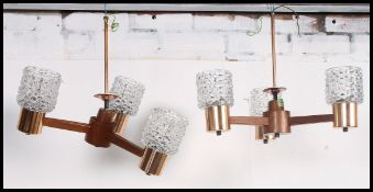 A pair of original teak and copper 3 branch 1960's wall - ceiling lights complete with the shades.
