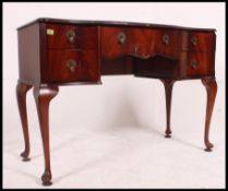 A mid 20th century Queen Anne style writing desk,
