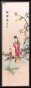A large 20th century embroidered Chinese hand stitch panel being framed and glazed.
