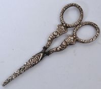 A pair of silver and steel 19th century embroidery scissors with crown and floral handles and