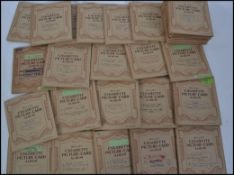 A collection 20th century Wills Cigarette picture card albums ( 29 in total ) containing cards