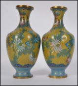 A pair of 20th century Chinese cloisonne enamel vases,