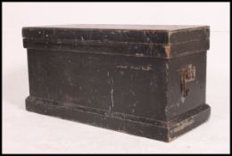 A Victorian ebonised pine workbox chest having hinged top with monogram to top having part fitted