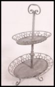 A vintage mid century unusual galvanised metal two tier garden planter stand with carry handle to