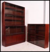 A 20th century tall mahogany stacking lawyers bookcase,