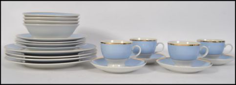 A modern Royal Doulton tea service with a classical blue band stripe pattern,