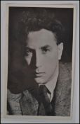FRANKIE HOWERD: A very early postcard sized signed autographed photo of Frankie Howerd - quarter