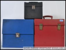 A collection of three vinyl record carry / storage cases.