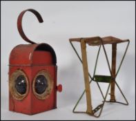 A vintage Kenyon's Industrial roadside industrial work lamp,