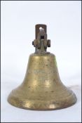 A vintage bell possibly from a ship of brass form ( lacking the strike ),