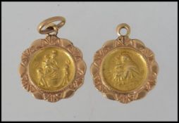 Two 18ct gold religious pendants Marked 750 Tests 18ct. Weight 2g.