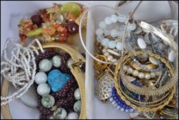 A collection of costume jewellery to include 925 silver earrings, white and yellow metal necklaces,