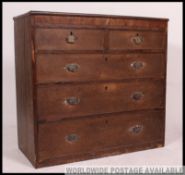 A 19th century Georgian country oak chest of drawers having 2 short over 3 deep drawer