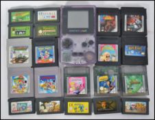 A retro Nintendo Gameboy in carry case with a selection of games to include Sonic