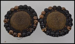 A large early 20th century hand sewn funeral Jet and bakelite beadwork motif cloak cape clip clasp.