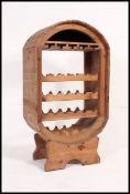 A large rustic pine wine rack of unusual shape having shelf to the top with wine rack centre,