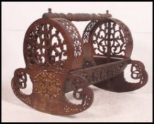 An unusual early 20th century Indian hardwood childs crib - moses basket.