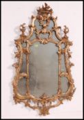 A good quality late 20th century reproduction rococo wall mirror,
