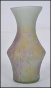 A small glass multicoloured 20th century vase in the manner of Loetz having frosted design with