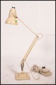 A mid century Herbert Terry anglepoise desk / table lamp in cream original colours with square