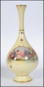A Royal Worcester hand painted cabinet vase signed J.