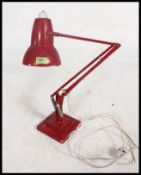 A Pre war Industrial Herbert Terry anglepoise lamp having square terraced base and pendant shade in